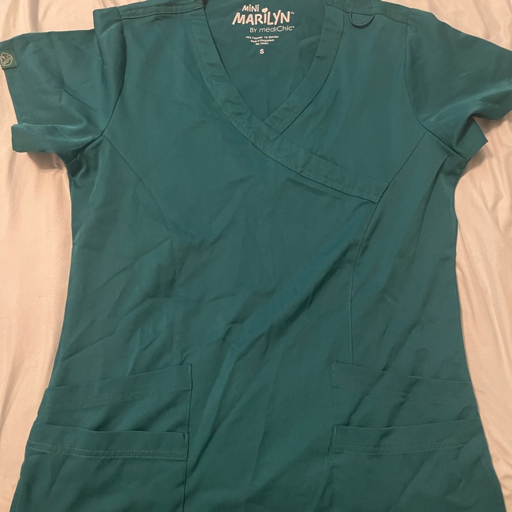 Size small green scrub top